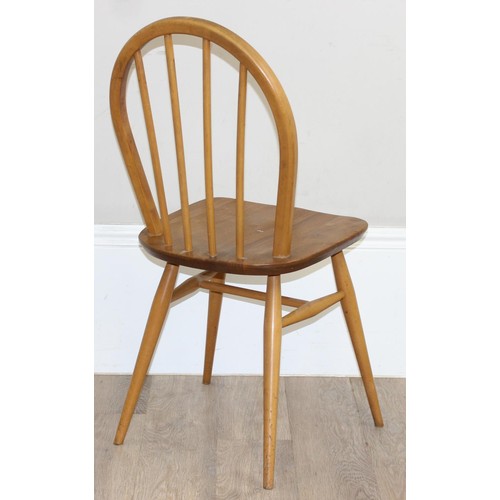 23 - A set of 4 Ercol hoop back dining chairs, blonde finish, model 400, each approx 87cm tall