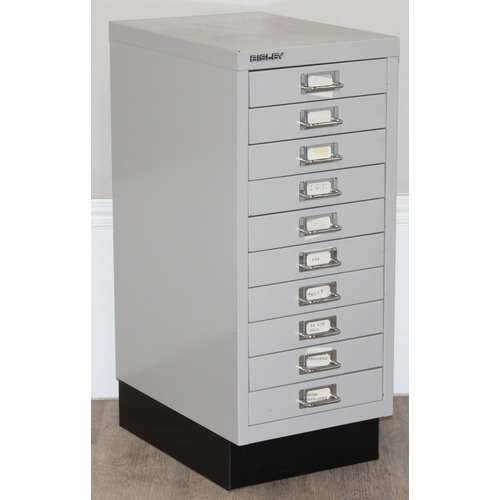 297 - A small light grey Bisley cabinet with 10 drawers, approx 28cm x 42cm x 68cm