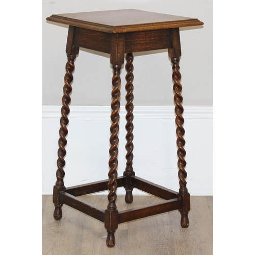 177 - An early 20th century oak side table or jardinière stand with barley-twist supports, approx 39cm squ... 