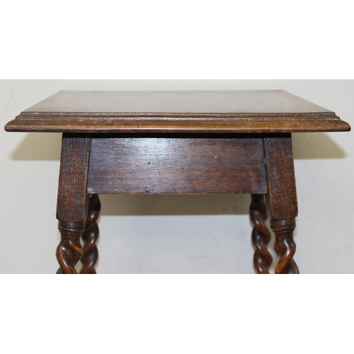 177 - An early 20th century oak side table or jardinière stand with barley-twist supports, approx 39cm squ... 