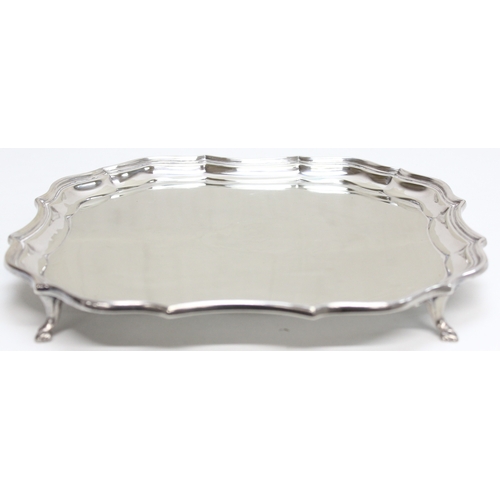 1097 - An early 20th century silver plated salver or card tray by Goldsmiths & Silversmiths Company, 26cm w... 