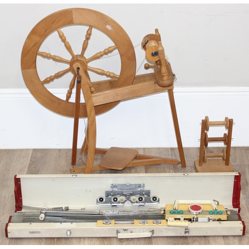 290 - Ashford of New Zealand spinning wheel, 3 spool reels on stand and an Empisal Knitmaster 305 knitting... 