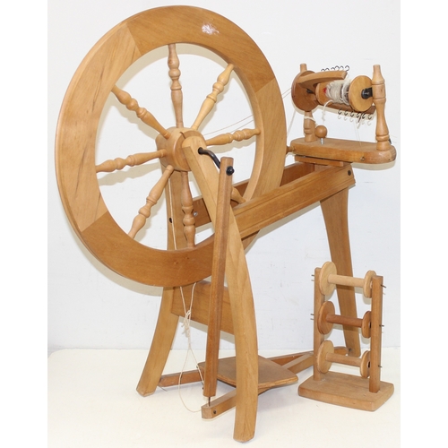 290 - Ashford of New Zealand spinning wheel, 3 spool reels on stand and an Empisal Knitmaster 305 knitting... 