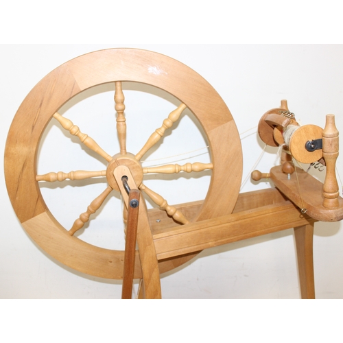 290 - Ashford of New Zealand spinning wheel, 3 spool reels on stand and an Empisal Knitmaster 305 knitting... 