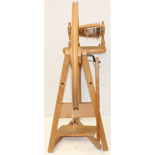 290 - Ashford of New Zealand spinning wheel, 3 spool reels on stand and an Empisal Knitmaster 305 knitting... 