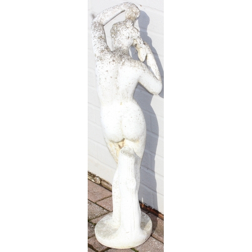 302 - A large vintage weathered reconstituted stone garden statue depicting a nude classical female, marke... 