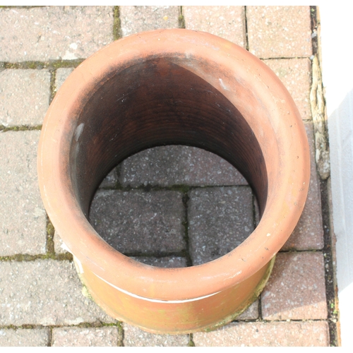 349 - 2 varying terracotta chimney pots, ideal for garden planters, largest approx 27cm W x 63cm H