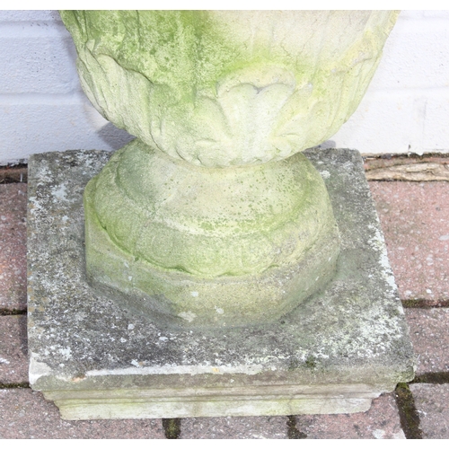 349B - 3 garden concrete plinths of varying shapes and a weathered garden urn, largest approx 32cm W x 43cm... 