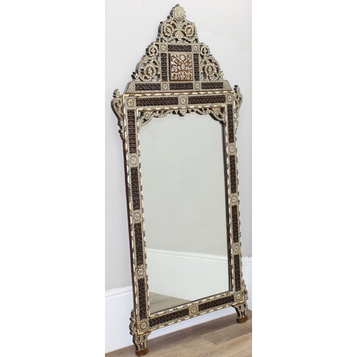 15 - Large Syrian mother of pearl inlaid wooden mirror, the intricately carved wood is inlaid with geomet... 