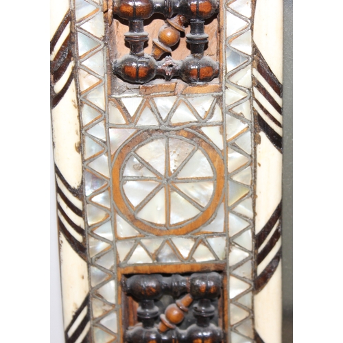 15 - Large Syrian mother of pearl inlaid wooden mirror, the intricately carved wood is inlaid with geomet... 