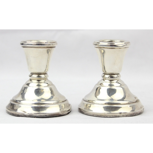 1099A - A pair of plain silver dwarf candlesticks, Birmingham 1973 by Sanders & Mackenzie, 6cm tall, 123.84g... 