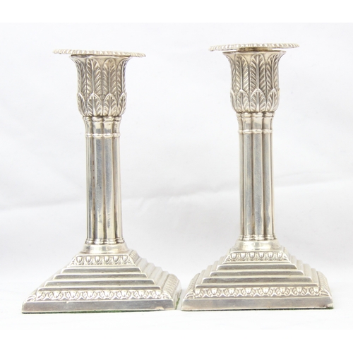 1099B - A pair of good quality antique silver plated candlesticks in the Georgian style, likely late 19th ce... 