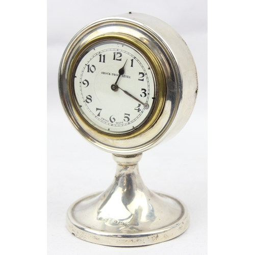 1099E - A silver mounted desk clock with mechanical movement, the case marked for Birmingham 1923 by Sydney ... 