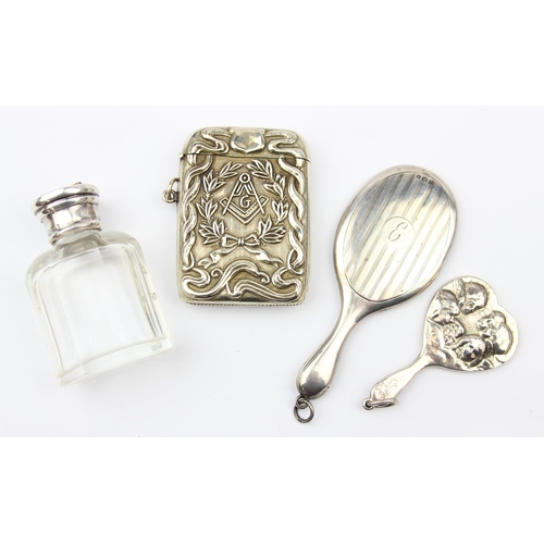 1099I - 2 silver chatelaine mirrors, one marked for Birmingham 1913, a small silver topped and mother of pea... 