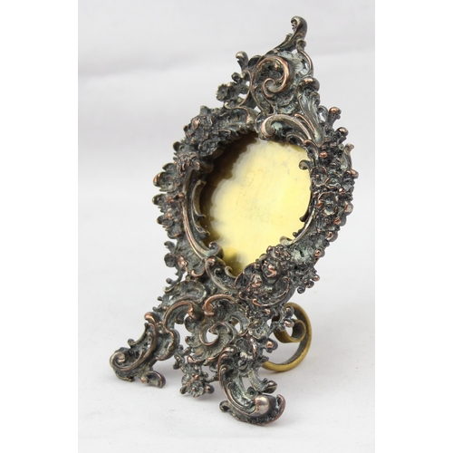 1099J - A very decorative German silver plated photograph frame of Rococo design, likely 19th century, marke... 