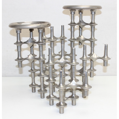 1018A - In the manner of Hans Nagel (German, 1926-1978) - a 15 piece modular metal stacking candlestick comp... 