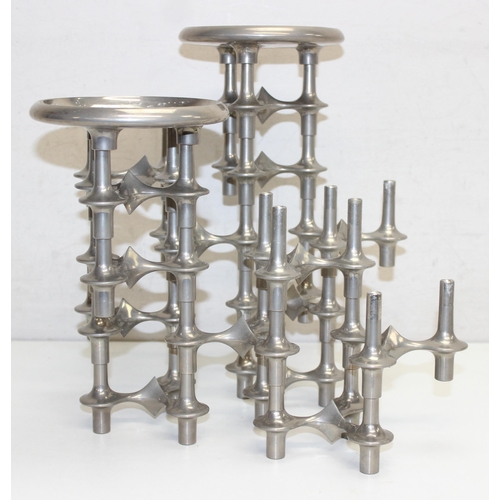 1018A - In the manner of Hans Nagel (German, 1926-1978) - a 15 piece modular metal stacking candlestick comp... 