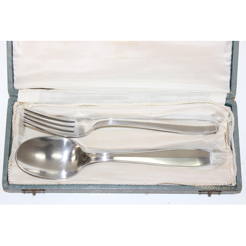 1018C - Christofle of France, a boxed silver plated serving spoon and fork, both marked and the box also sim... 