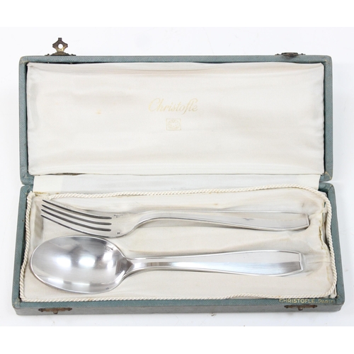 1018C - Christofle of France, a boxed silver plated serving spoon and fork, both marked and the box also sim... 