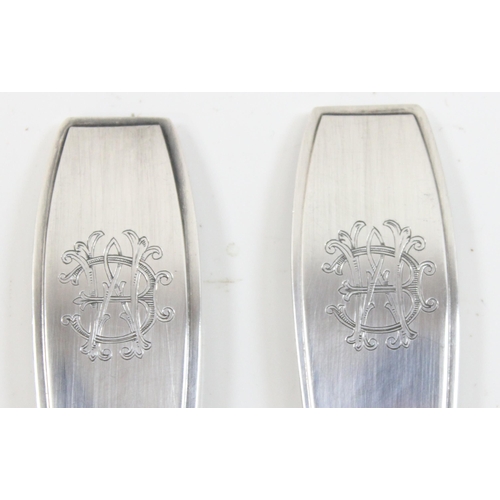 1018C - Christofle of France, a boxed silver plated serving spoon and fork, both marked and the box also sim... 