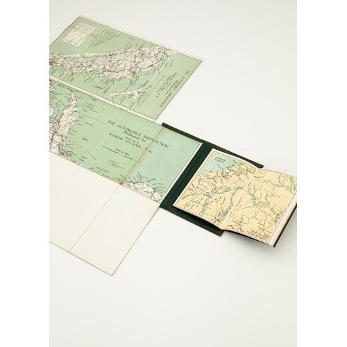 18 - A vintage leather bound New Zealand road map set showing both the North & South Islands, the gilt to... 