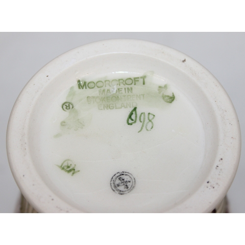 1458 - A Moorcroft pottery vase of baluster form, Anna Lily pattern, late 20th century, marks to base, and ... 