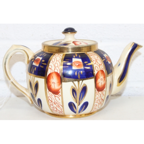 1458 - A Moorcroft pottery vase of baluster form, Anna Lily pattern, late 20th century, marks to base, and ... 