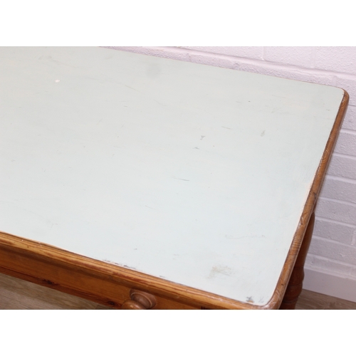 57 - A vintage pine dining table of small proportions, single drawer with duck egg blue painted top, 90cm... 