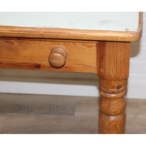 57 - A vintage pine dining table of small proportions, single drawer with duck egg blue painted top, 90cm... 