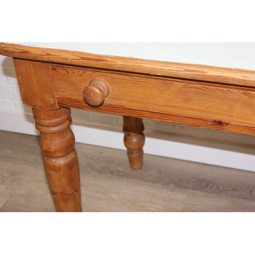 57 - A vintage pine dining table of small proportions, single drawer with duck egg blue painted top, 90cm... 