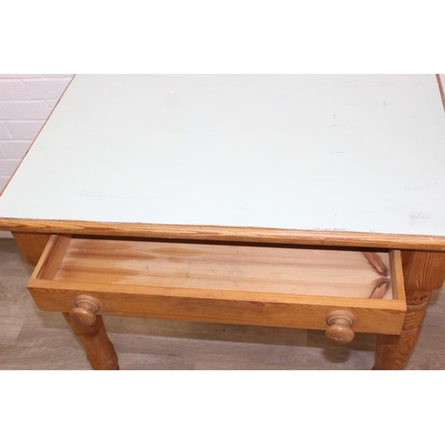 57 - A vintage pine dining table of small proportions, single drawer with duck egg blue painted top, 90cm... 
