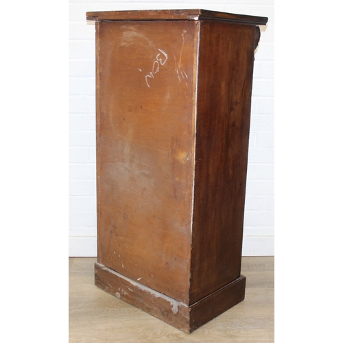 4 - An antique mahogany Wellington chest, seven drawers with turned handles and carved details to pillar... 