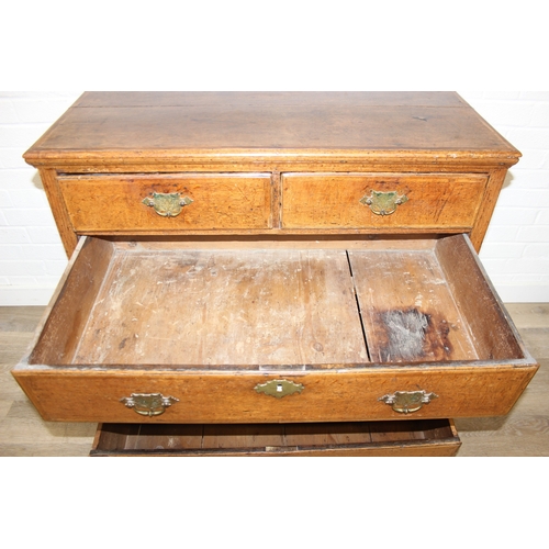 3 - A Georgian oak two over three chest of drawers with brass fittings, likely 18th century, 95cm x 53cm... 