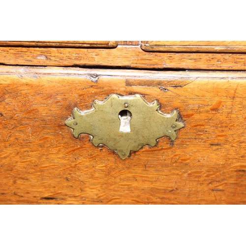 3 - A Georgian oak two over three chest of drawers with brass fittings, likely 18th century, 95cm x 53cm... 