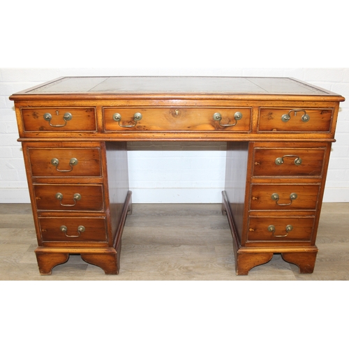 198 - An antique style three part pedestal desk with green inset leather top, 121cm x 60cm x 78cm