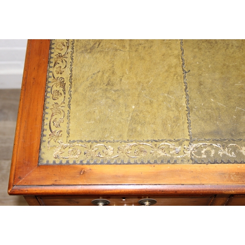 198 - An antique style three part pedestal desk with green inset leather top, 121cm x 60cm x 78cm