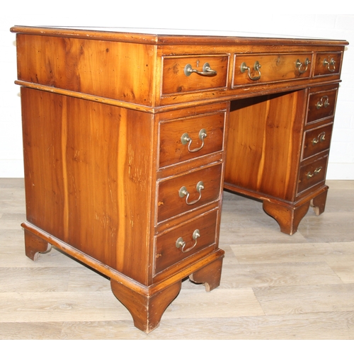 198 - An antique style three part pedestal desk with green inset leather top, 121cm x 60cm x 78cm