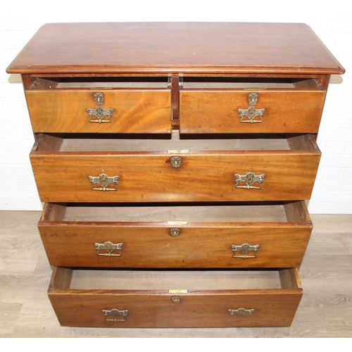 29 - An antique two over three mahogany chest of drawers with Secessionist Art Nouveau period brass handl... 