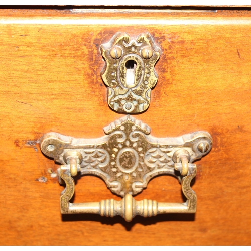 29 - An antique two over three mahogany chest of drawers with Secessionist Art Nouveau period brass handl... 