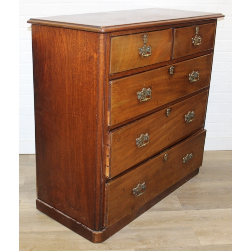 29 - An antique two over three mahogany chest of drawers with Secessionist Art Nouveau period brass handl... 