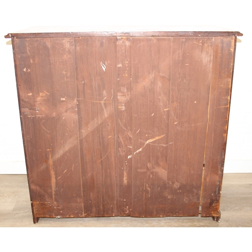 29 - An antique two over three mahogany chest of drawers with Secessionist Art Nouveau period brass handl... 