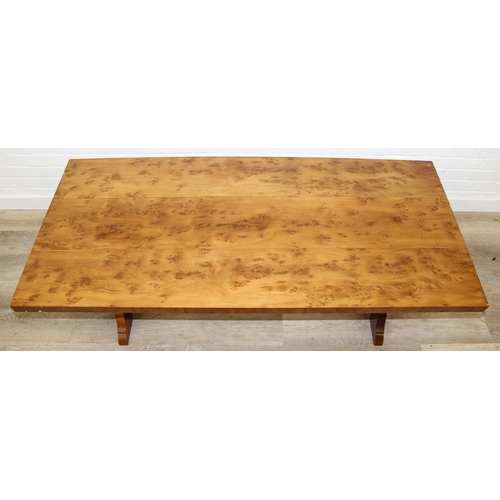 199C - A superb quality modern coffee table with yew wood finish, lion mask adornments to legs, 143cm x 69c... 