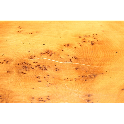 199C - A superb quality modern coffee table with yew wood finish, lion mask adornments to legs, 143cm x 69c... 