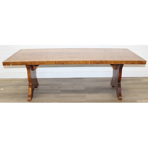 199C - A superb quality modern coffee table with yew wood finish, lion mask adornments to legs, 143cm x 69c... 