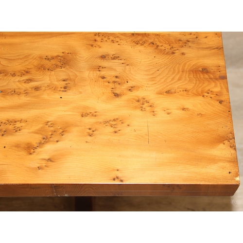 199C - A superb quality modern coffee table with yew wood finish, lion mask adornments to legs, 143cm x 69c... 