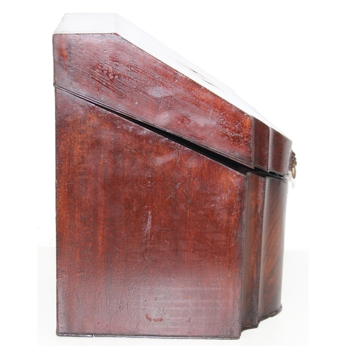 274 - An antique mahogany serpentine-fronted knife box with inlaid details, early 19th century, lacking in... 