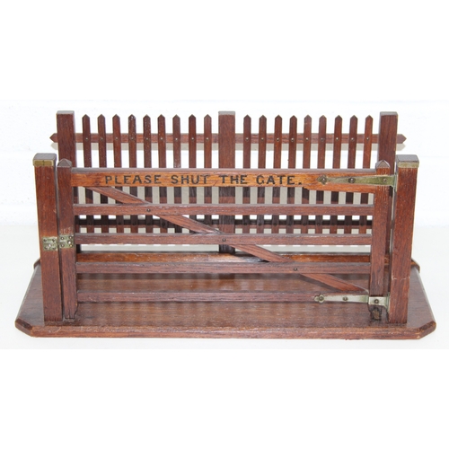 276 - Vintage wooden novelty magazine/paper rack formed as a farmgate with picket fence, 49cm x 18cm x 21c... 