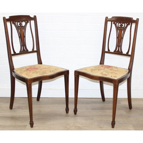 97 - A pair of antique mahogany bedroom chairs with inlaid back, both labels under for J.A. Shoolbred of ... 