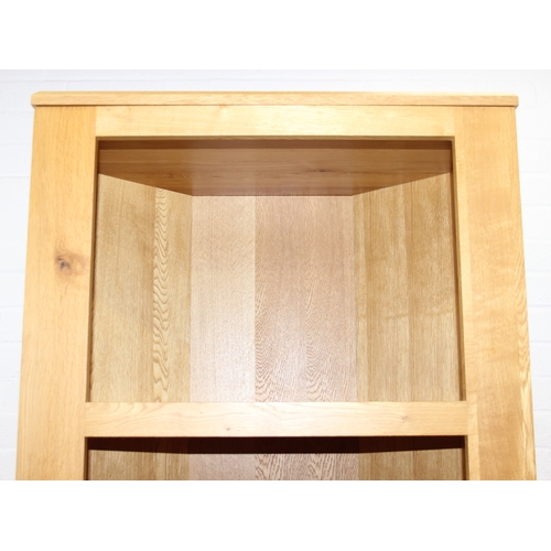 48 - A large good quality modern light oak book shelf or display shelf, 70cm x 50cm x 206cm