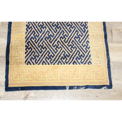 202 - Two antique style Ningxia (Ninghsia) Key-Fret designed rugs, the largest 193cm x 83cm [2]